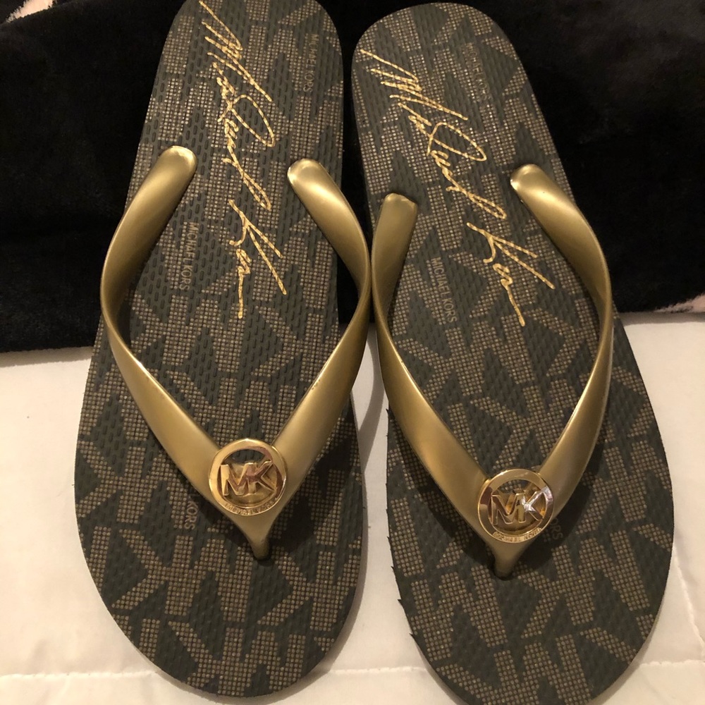 Authentic new, never worn Micheal Kors slippers
